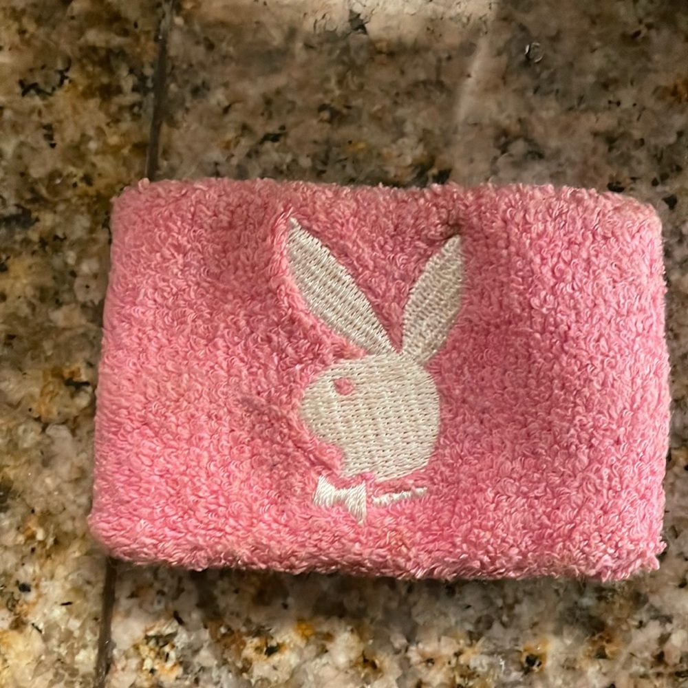 Vintage Playboy pink soft wrist band. In fair condition.
